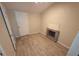 Bedroom with tiled floors and unique fireplace feature, providing a cozy ambiance at 4607 N 35Th St, Tampa, FL 33610