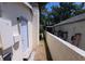 Exterior view of home with brick accent wall and neutral paint at 4607 N 35Th St, Tampa, FL 33610