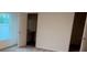 Light-filled bedroom with ensuite bathroom and walk-in closet, offering privacy and convenience at 5407 Kedgewick Ln, North Port, FL 34288