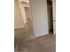 This bedroom features neutral walls and soft carpeting creating a calm space at 5407 Kedgewick Ln, North Port, FL 34288