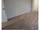 This bedroom includes neutral walls with soft carpeting, as well as an attached closet and bathroom at 5407 Kedgewick Ln, North Port, FL 34288