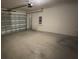 Spacious two-car garage offers plenty of room for vehicles and storage at 5407 Kedgewick Ln, North Port, FL 34288