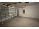 This is a roomy two-car garage that provides lots of space for parking and storage at 5407 Kedgewick Ln, North Port, FL 34288
