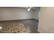 Living room featuring a ceiling fan, wood floors and a granite countertop at 5407 Kedgewick Ln, North Port, FL 34288
