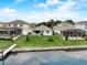 Beautiful backyard with water access and scenic view of the water at 5413 Wishing Arch Dr, Apollo Beach, FL 33572