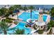 Resort-style community pool featuring a playful lighthouse slide, perfect for relaxation and recreation at 5413 Wishing Arch Dr, Apollo Beach, FL 33572
