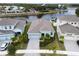 A beautifully landscaped home with a two-car garage on the water at 5413 Wishing Arch Dr, Apollo Beach, FL 33572