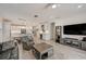 Bright open living space with bar, dining, kitchen and living room at 5413 Wishing Arch Dr, Apollo Beach, FL 33572