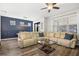 Living room with plenty of natural light and comfortable seating area at 5717 Village Center Dr, Lithia, FL 33547