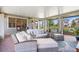 Covered patio with brick flooring, comfortable seating, and view of the backyard at 5717 Village Center Dr, Lithia, FL 33547