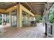 Spacious patio with tables and fans offers a comfortable outdoor gathering spot at 5717 Village Center Dr, Lithia, FL 33547