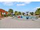 Gathering-friendly splash pad area with playful water features and a nearby pool for endless fun at 5717 Village Center Dr, Lithia, FL 33547