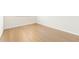 Bright bedroom with hardwood floors, white walls, and large windows at 6025 Shore S Blvd # 409, Gulfport, FL 33707