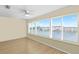 Bedroom with waterfront views from the windows and hardwood floors at 6025 Shore S Blvd # 409, Gulfport, FL 33707