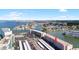 Aerial view of the waterfront condo building with stunning bay views and convenient parking at 6025 Shore S Blvd # 409, Gulfport, FL 33707