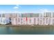 The waterfront condo building boasts serene views, direct water access, and a tranquil setting at 6025 Shore S Blvd # 409, Gulfport, FL 33707