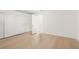 Light-filled bedroom with multiple closets and wood flooring at 6025 Shore S Blvd # 409, Gulfport, FL 33707