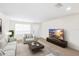 Comfortable living room with natural light and stylish decor at 6025 Shore S Blvd # 409, Gulfport, FL 33707