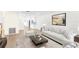 Spacious living room with a view into the kitchen area at 6025 Shore S Blvd # 409, Gulfport, FL 33707