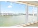 Large windows offering views of the waterfront from the unit at 6025 Shore S Blvd # 409, Gulfport, FL 33707