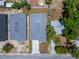 An aerial view of two freshly constructed homes with new roofs and concrete driveways at 6097 Vermont Ave, New Port Richey, FL 34653