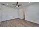Bedroom featuring wood-look flooring, recessed lighting and a ceiling fan at 6097 Vermont Ave, New Port Richey, FL 34653