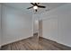Spacious bedroom with a ceiling fan and closet for all of your storage needs at 6097 Vermont Ave, New Port Richey, FL 34653