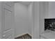 Pantry featuring modern shelving, ample storage space, and sleek finishes for organized kitchen convenience at 6097 Vermont Ave, New Port Richey, FL 34653