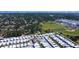 Aerial view of the community and nearby school at 663 54Th S Way # 146, Gulfport, FL 33707