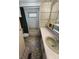 This bathroom features a tub, vanity and patterned wall paper at 663 54Th S Way # 146, Gulfport, FL 33707