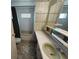 Bathroom featuring a vanity, mirror, patterned wallpaper, and a tub at 663 54Th S Way # 146, Gulfport, FL 33707