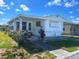 Charming single-story home featuring a covered entryway and well-maintained lawn at 663 54Th S Way # 146, Gulfport, FL 33707