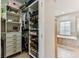 Walk-in closet with custom shelving and storage solutions at 7705 S Sparkman St, Tampa, FL 33616