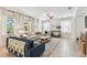 Bright living room with a neutral color palette, tile floors, and lots of natural light at 7705 S Sparkman St, Tampa, FL 33616