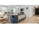 Inviting living room featuring neutral décor, tile flooring and bright lighting at 7705 S Sparkman St, Tampa, FL 33616