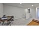 Spacious bonus room with carpet flooring, ideal for an office or recreation area at 7709 Imagination Pl, Wesley Chapel, FL 33545