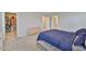 Spacious main bedroom featuring a walk-in closet and a serene atmosphere at 7709 Imagination Pl, Wesley Chapel, FL 33545