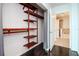 Open closet with custom shelving and hardwood floors at 777 N Ashley Dr # 2608, Tampa, FL 33602