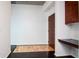 Bright entryway with tile flooring, desk, and front door at 777 N Ashley Dr # 2608, Tampa, FL 33602