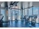 Bright fitness center with modern exercise equipment and floor-to-ceiling windows offering city views at 777 N Ashley Dr # 2608, Tampa, FL 33602