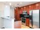Well-equipped kitchen featuring stainless steel appliances, modern cabinetry, and a breakfast bar at 777 N Ashley Dr # 2608, Tampa, FL 33602