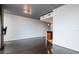 Cozy living room with hardwood floors and view of the kitchen at 777 N Ashley Dr # 2608, Tampa, FL 33602