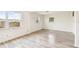 Bright bedroom with hardwood floors and natural light coming through the windows at 8528 Iris Ave, Seminole, FL 33777