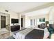 Spacious main bedroom with modern decor, walk-in shower, and plenty of natural light at 8528 Iris Ave, Seminole, FL 33777