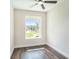 A simple, clean bedroom with a view at 9416 Bullfrog Court, Gibsonton, FL 33534