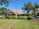 Attractive building with beautiful landscaping, showcasing a well-maintained exterior at 946 Madrid Dr, Palm Harbor, FL 34684