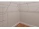Spacious walk-in closet featuring wire shelving for ample storage and organization at 9989 Surrey Rose Dr, San Antonio, FL 33576