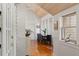 Bright dining room boasts vaulted ceilings, natural light, and hardwood floors at 1001 E Crawford St, Tampa, FL 33604