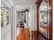 Hallway view into home with access to an office at 1001 E Crawford St, Tampa, FL 33604