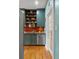 Functional kitchen with stainless steel appliances and wood cabinets, offering ample storage at 1001 E Crawford St, Tampa, FL 33604